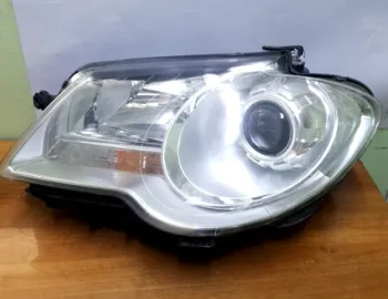 Far față - Parte montare: Stânga - Volkswagen Touran 1 generation