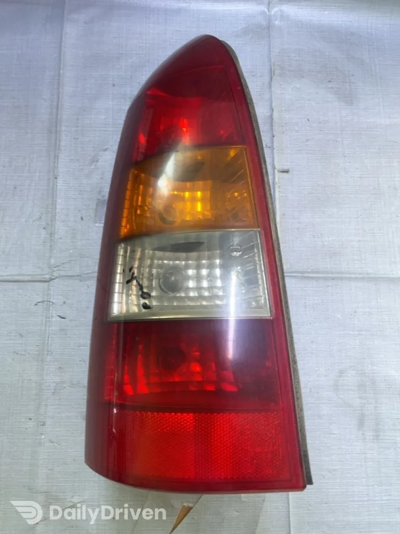 Lampă spate - Parte montare: Stânga spate, Varianta: Wagon 5 uși - Opel Astra G [1998 - 2009] wagon 5-doors