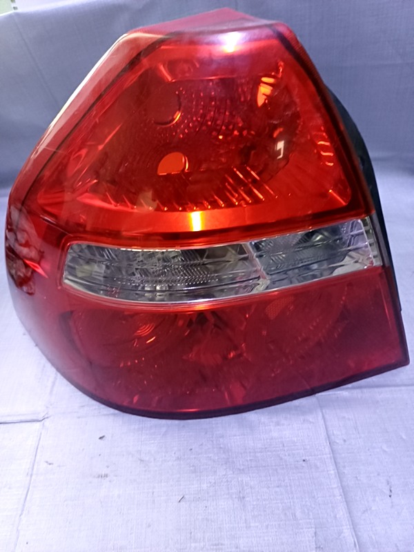 Lampă spate - Parte montare: Stânga , Varianta: Sedan - Chevrolet Aveo T200 [2003 - 2008] Sedan 1.2 MT (72 hp)