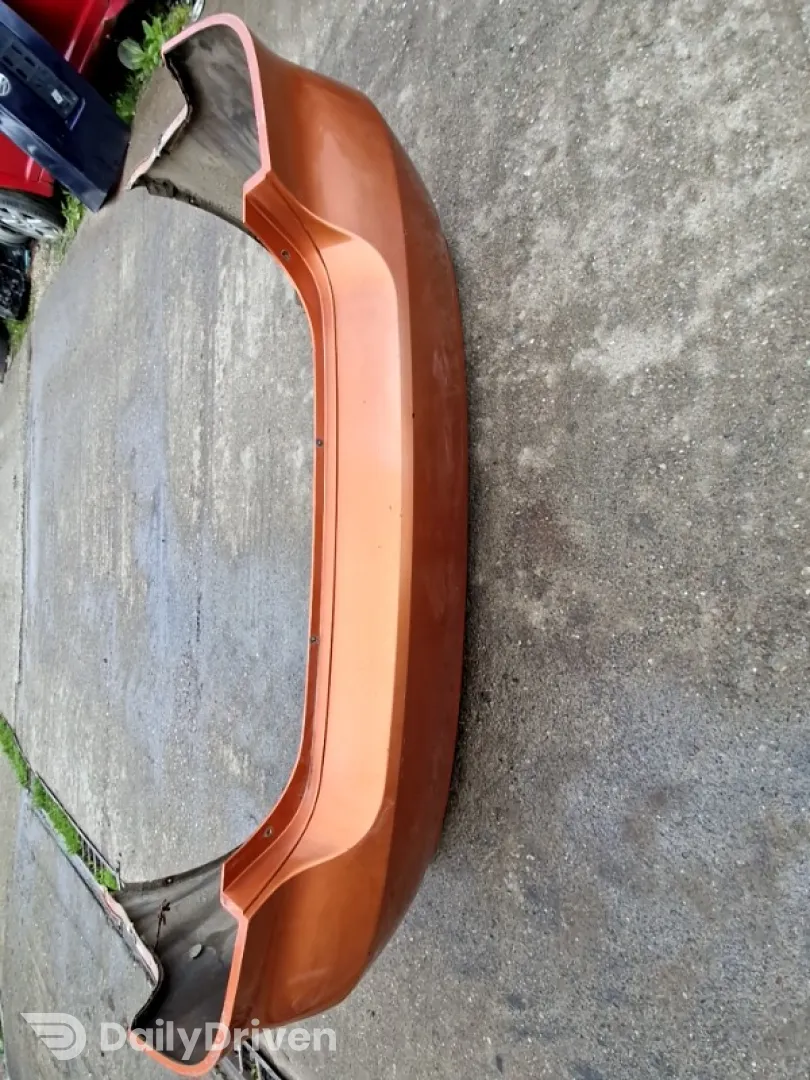 Bară protecție - Culoare: Portocaliu, Parte montare: Spate - Chevrolet Aveo T200 [2003 - 2008] Sedan 1.2 MT (72 hp)