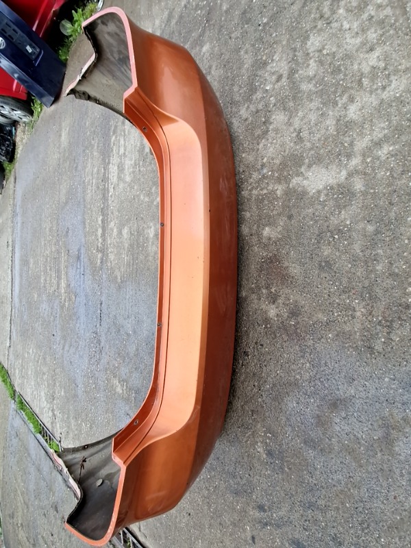 Bară protecție - Culoare: Portocaliu, Parte montare: Spate - Chevrolet Aveo T200 [2003 - 2008] Sedan 1.2 MT (72 hp)