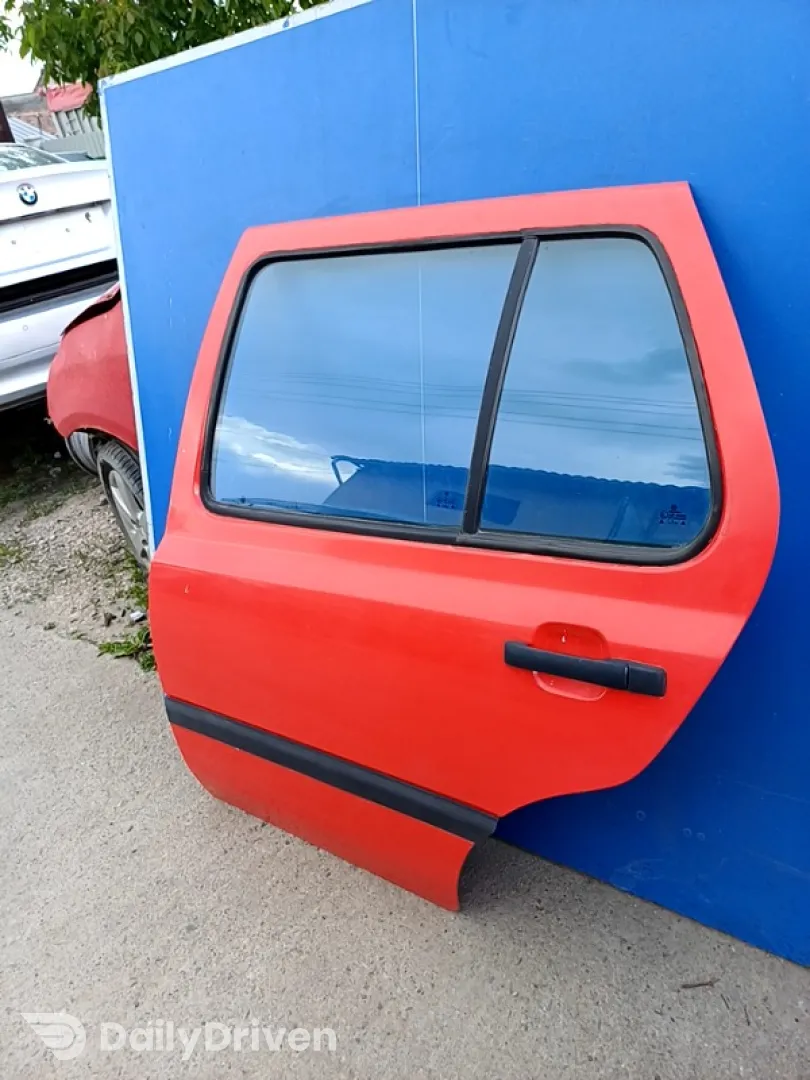 Ușă spate - Culoare: Roșu, Parte montare: Stânga, Varianta: Hatchback - Volkswagen Golf 3 generation [1991 - 1998] Hatchback 5-doors 1.4 5MT (60 hp)