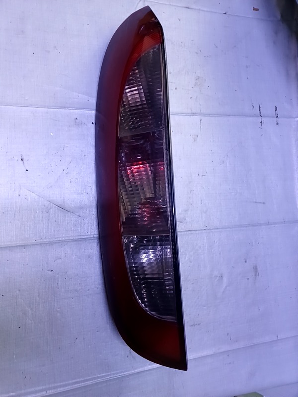 Lampă spate - Parte montare: Stânga, Varianta: Hatchback - Opel Corsa C [2000 - 2003] Hatchback 5-doors 1.2 MT (75 hp)