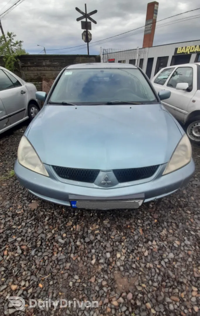 Dezmembram Mitsubishi Lancer IX [2000 - 2005] Sedan 4-usi