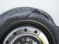 Dégât sur le flanc du pneu ?