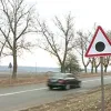 What the red triangle with a black dot road sign means in romania