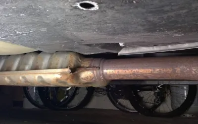 How to repair a damaged or rusted exhaust system